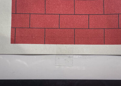 Klebestreifen zum Fixieren der Vorlage